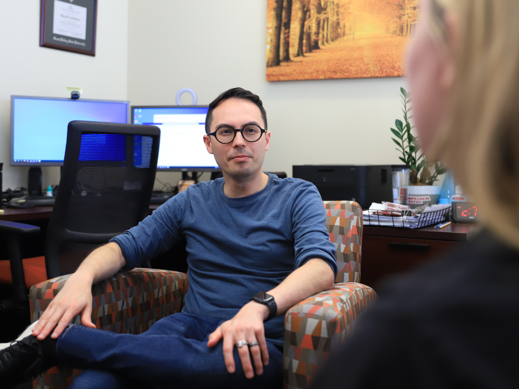A CAPS staff member listening to a client.